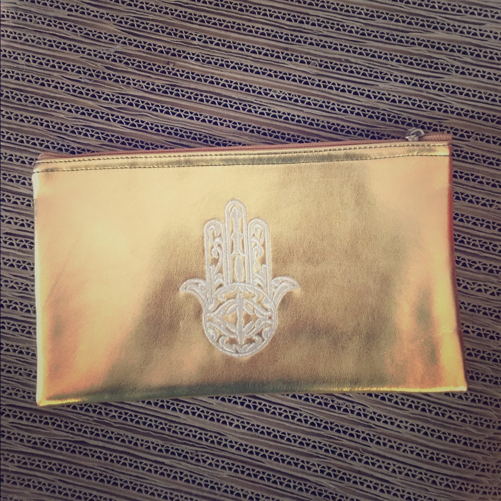 💫 3/$20 Metallic gold zipped pouch from Marrakech