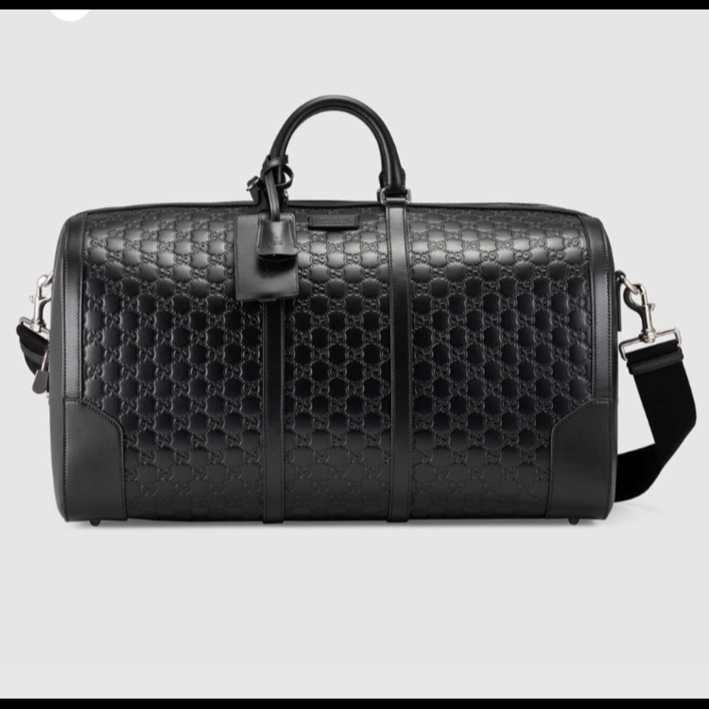 Black Gucci leather duffle bag