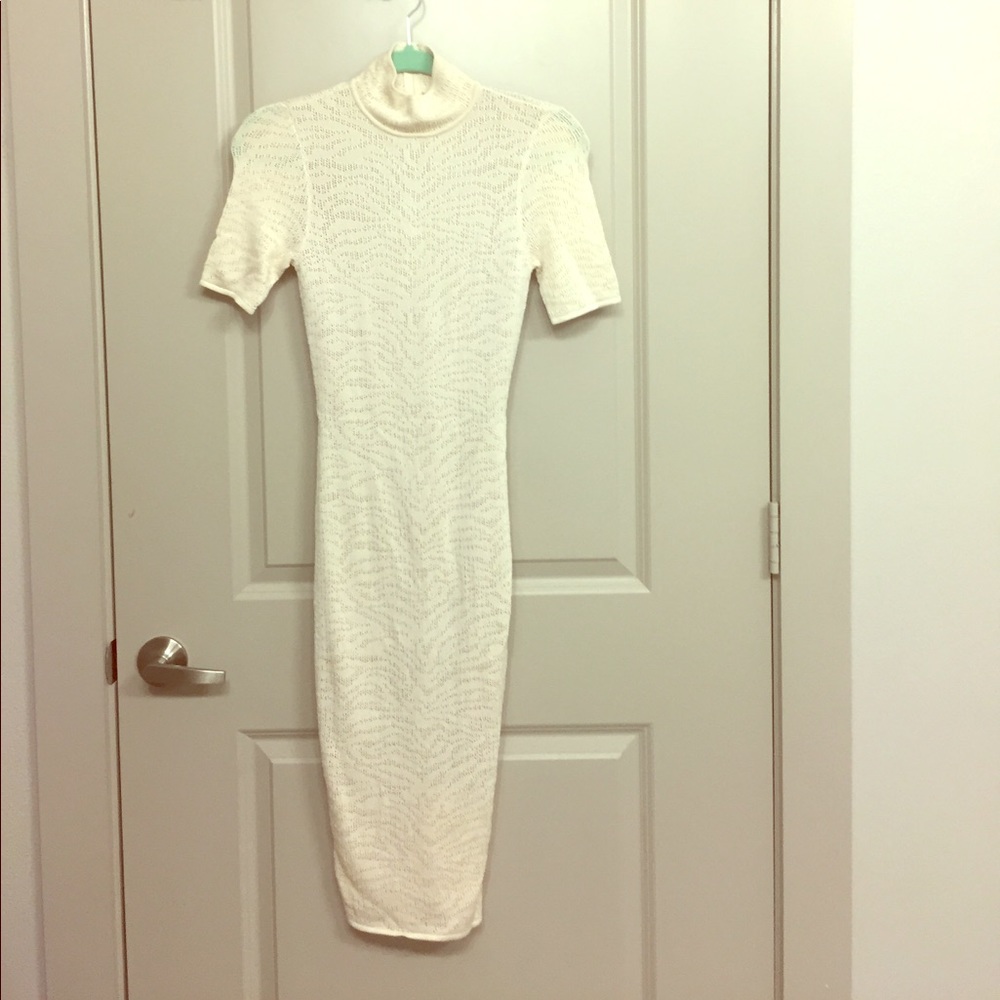 Ronny kobo pearl white dress hits below the knees