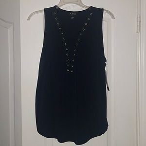 Sleeveless, deep V neck line shirt