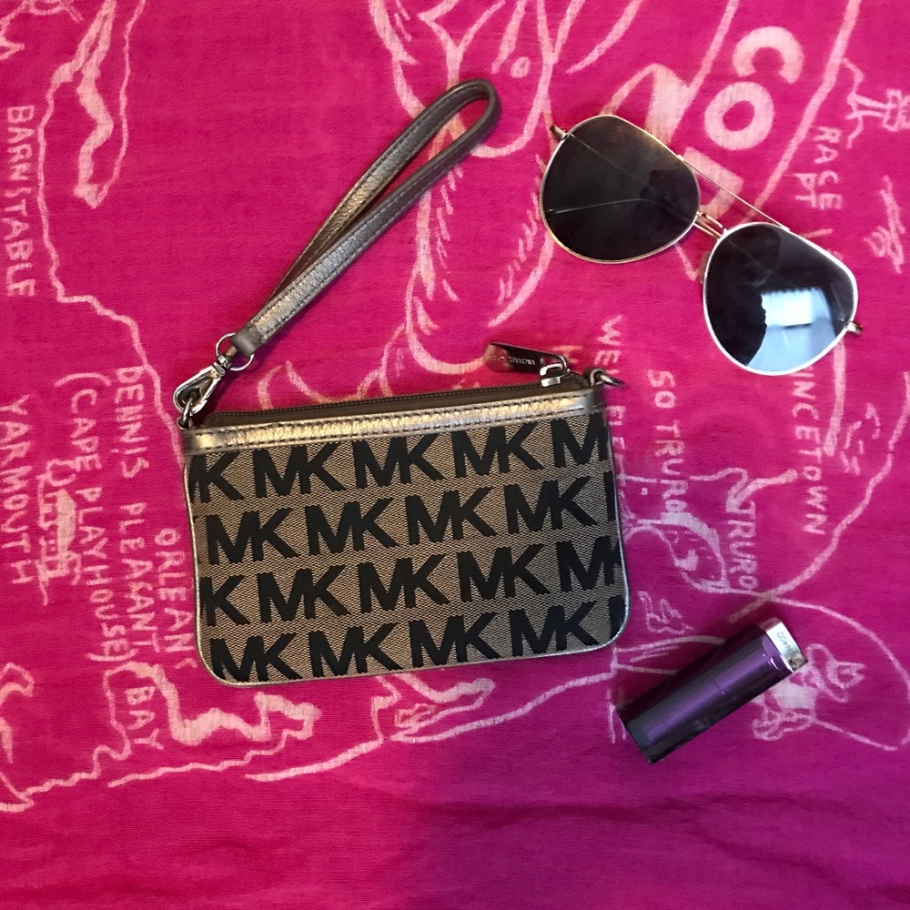 Micheal Kors monogram wristlet