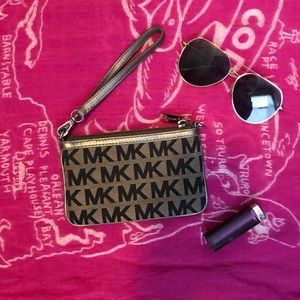 Micheal Kors monogram wristlet