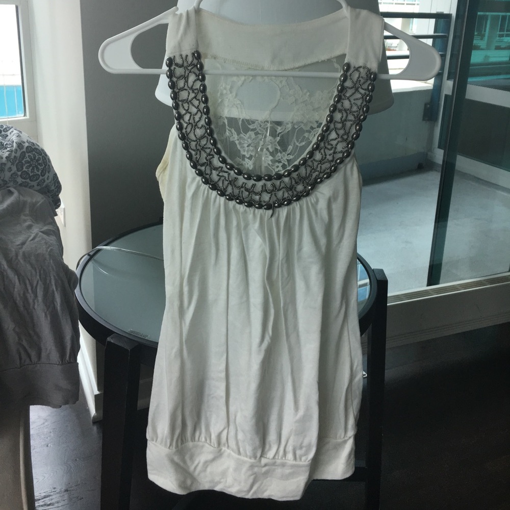 White decorative tank, lace back.