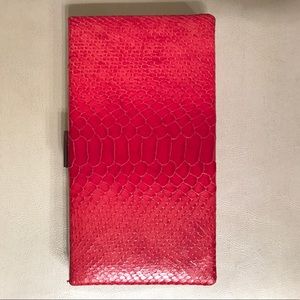 Banana Republic mango snakeskin clutch.