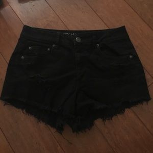 Black distressed shorts from American Eagle