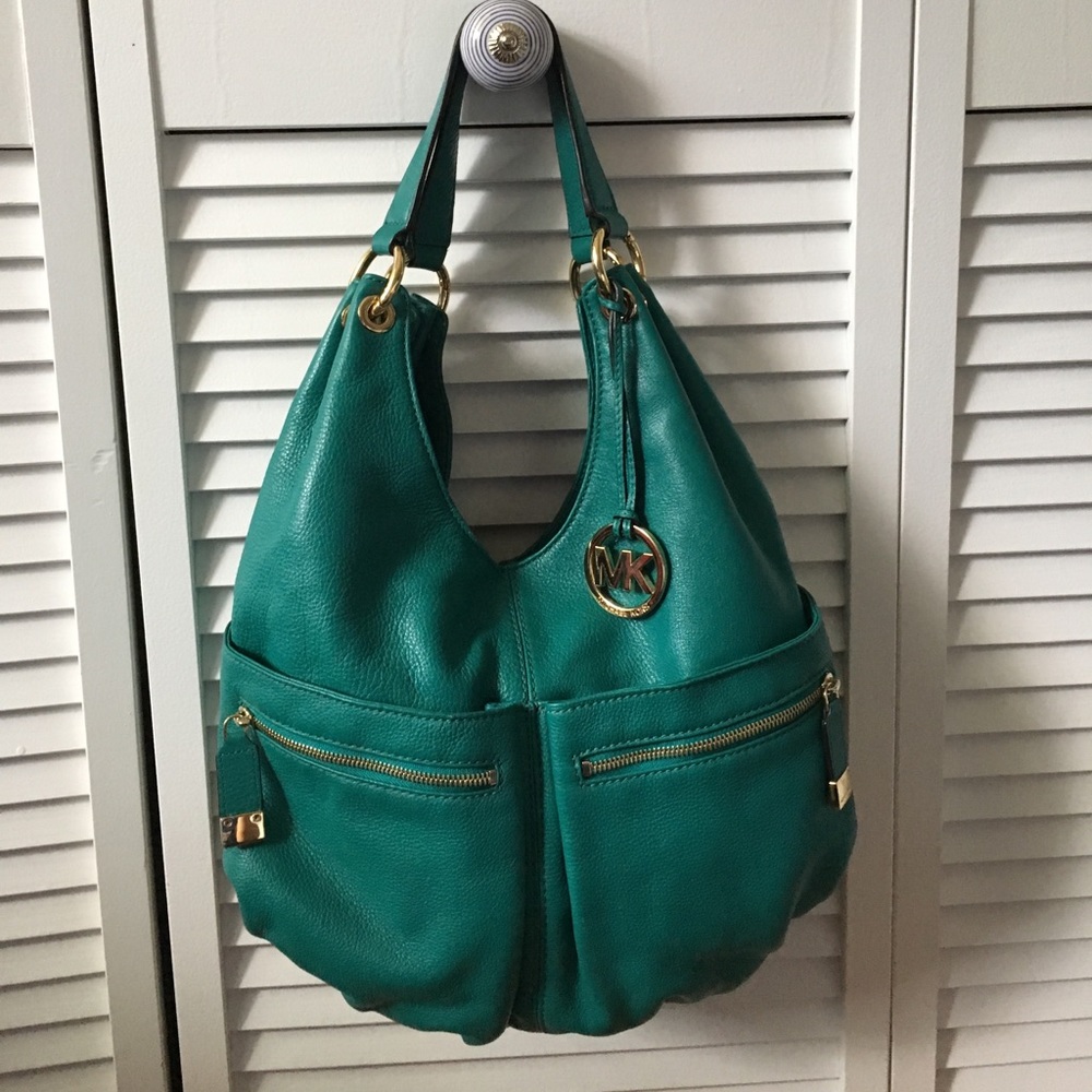 MK turquoise-colored bag with dust bag!