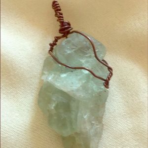 Handmade raw wire wrapped  green calcite crystal