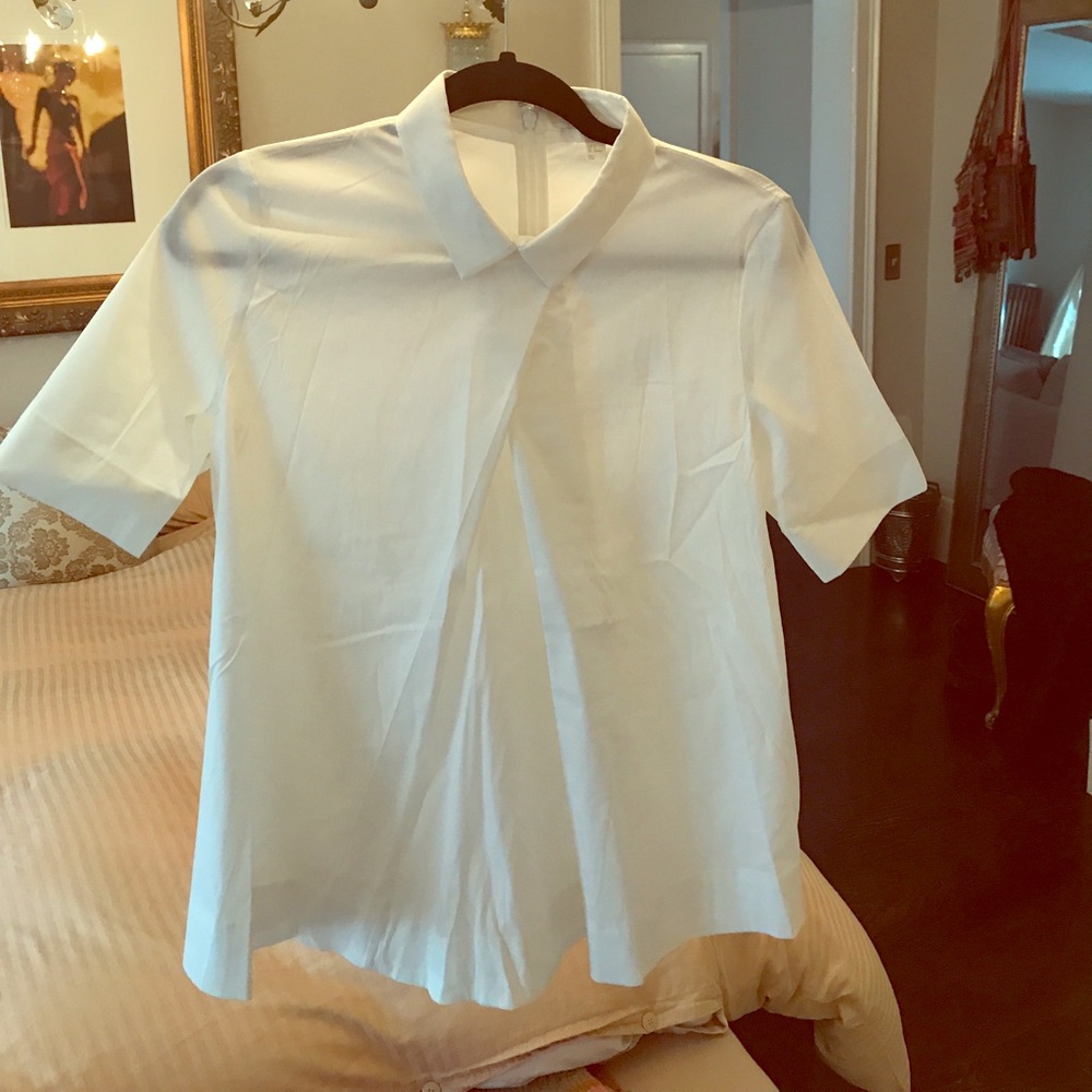 Classic crisp white blouse with a twist