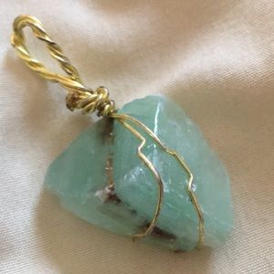 Handmade wire wrapped green calcite crystal