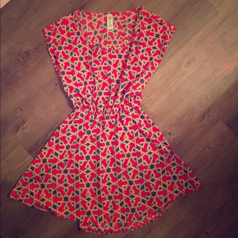 Stunning open triangle open back dress