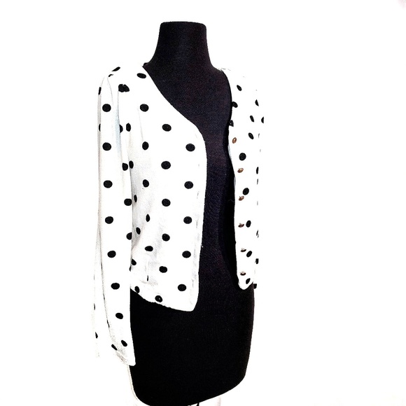 Freestyle Sweaters - White and black cardigan with gold buttons.