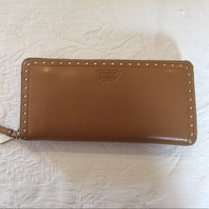Coach zip wallet.