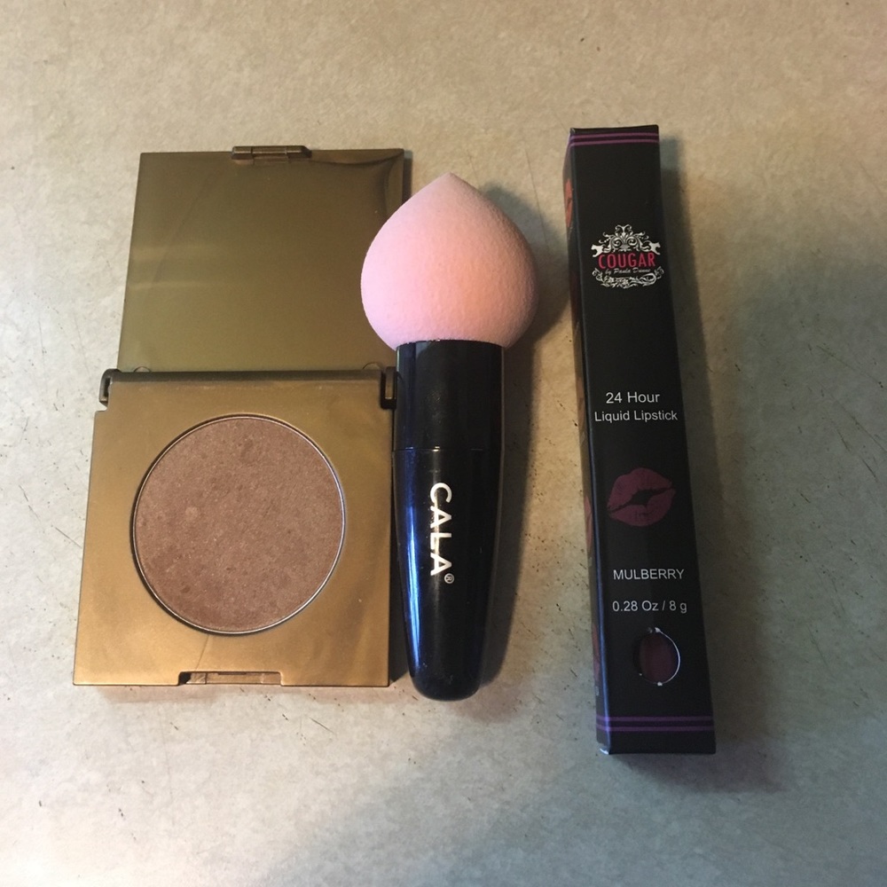 Tarte Bronzer, Couger lipgloss, and CALA sponge.