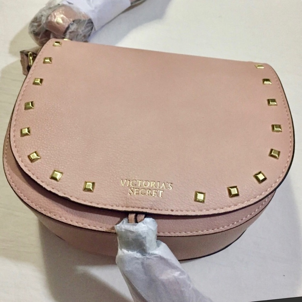 VS light pink cross body saddle purse