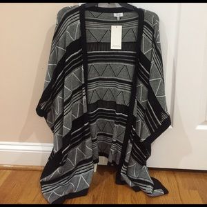 Black, gray, and white knit cardigan