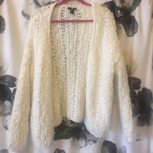 Chunky knit cardigan sweater.