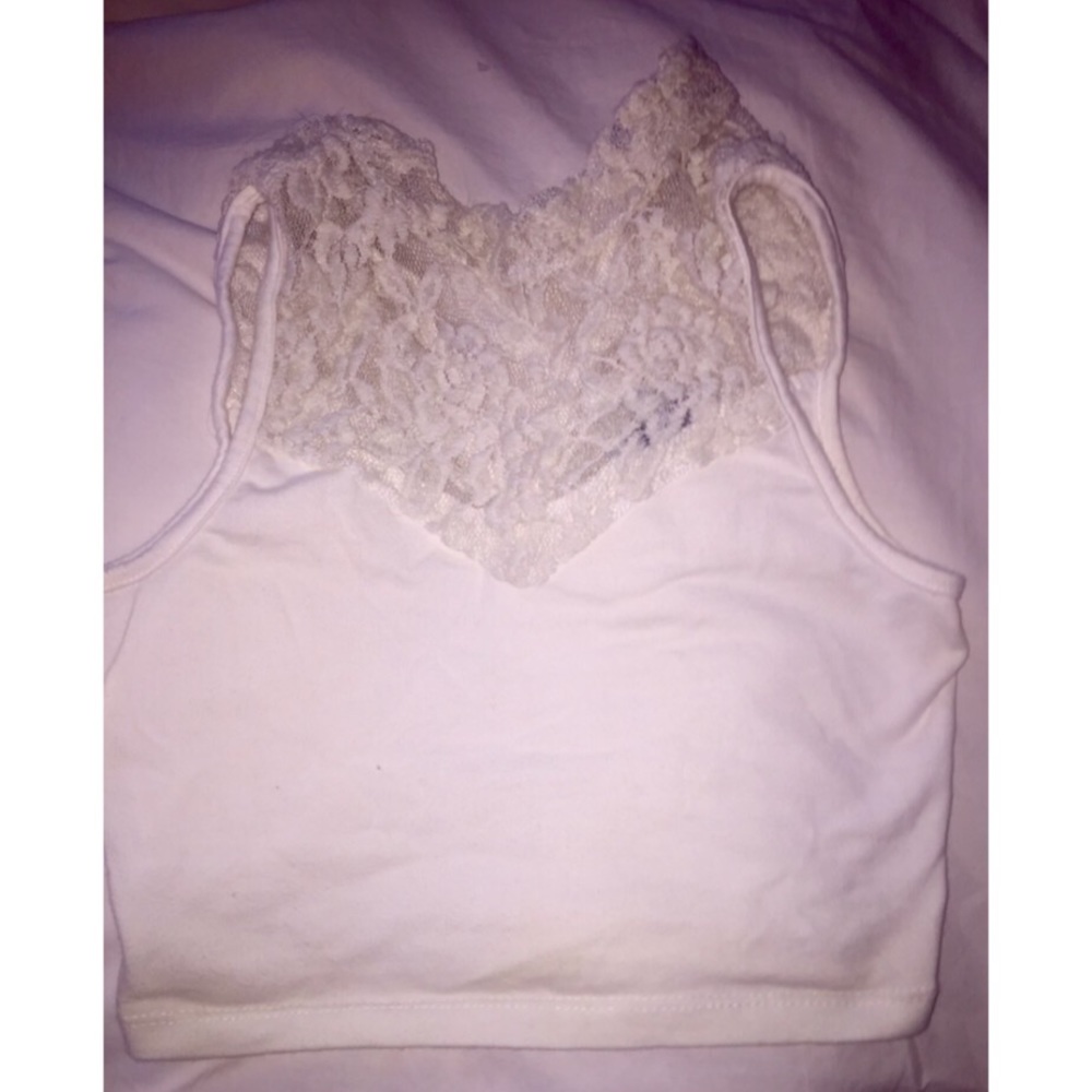 Tight off white sleeveless high neck crop top