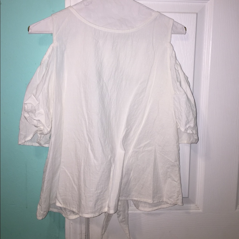 Super cute cold shoulder, open back blouse