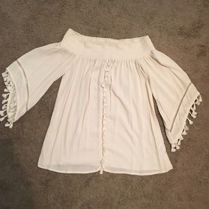 Off white, off the shoulder, pom pom shirt