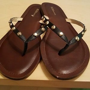 Gold studded flip flops