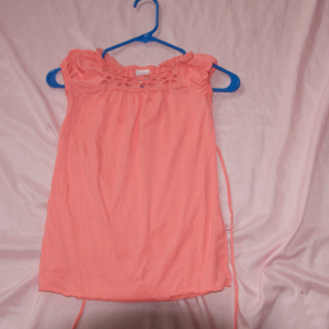 pink child's designer blouse