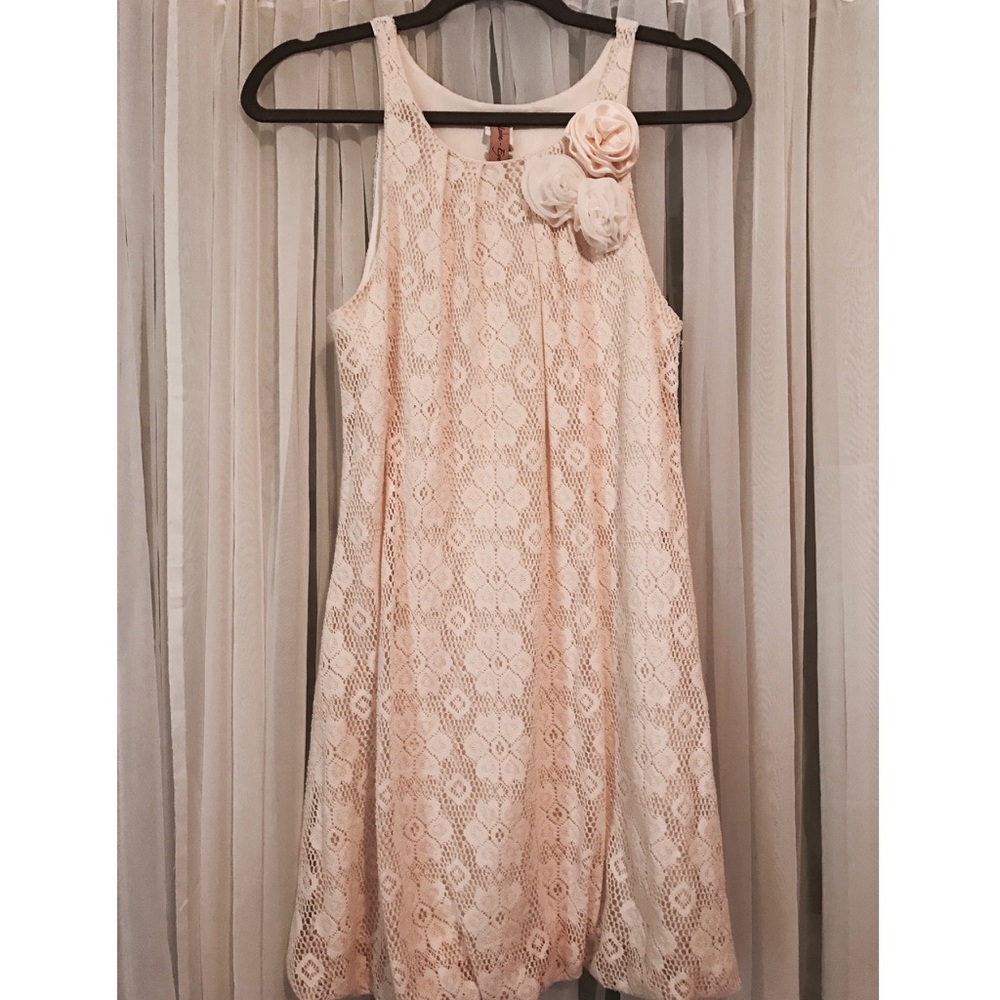 Crocheted dress with flower accent