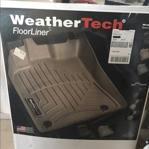 Toyota Sequoia WeatherTech floor mats.