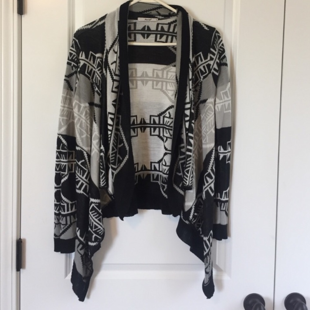 A cardigan with aztec pattern