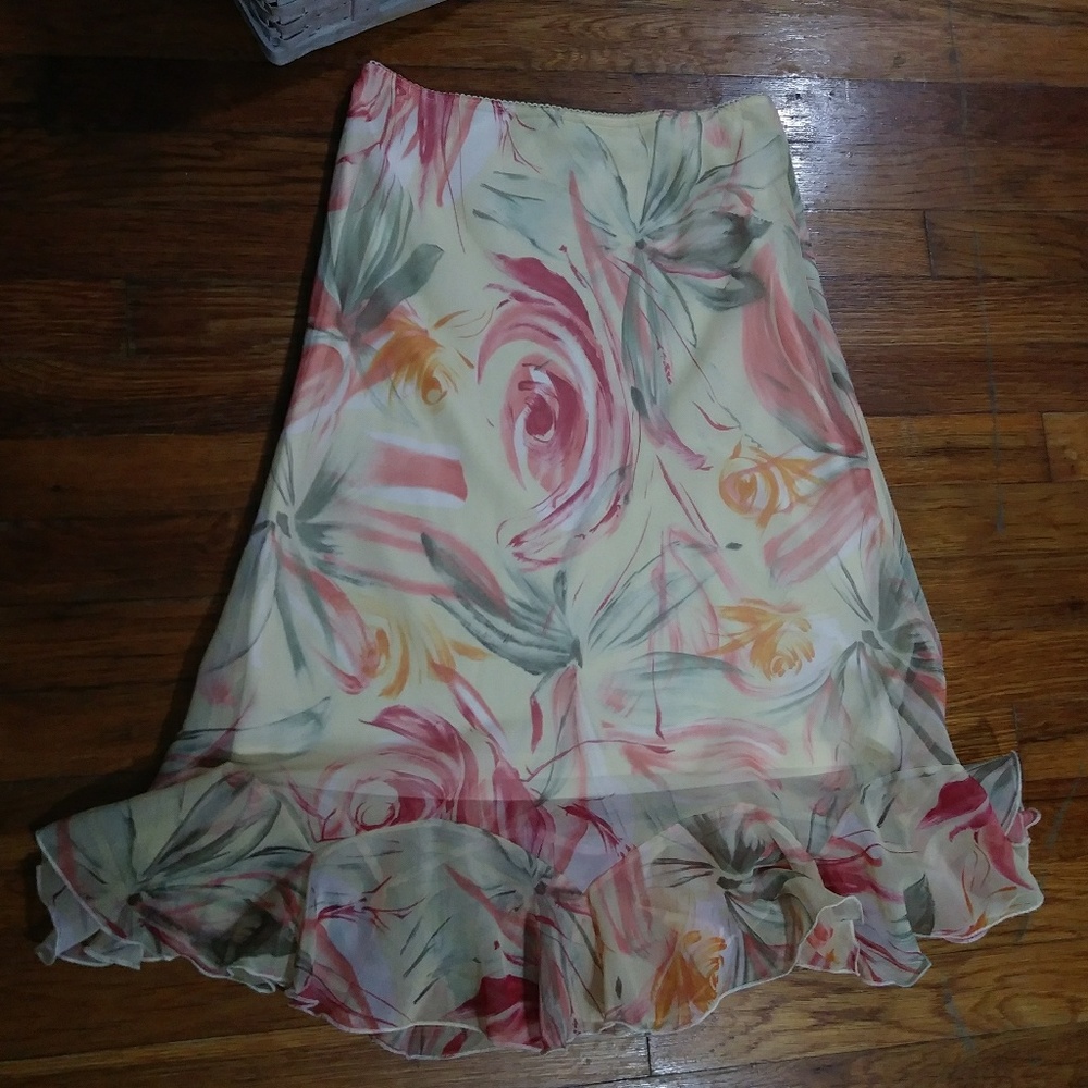 Yellow floral print skirt.