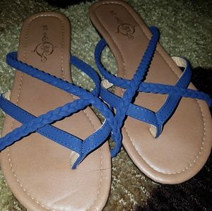 Worn once. Flat flip flops. Navy blue