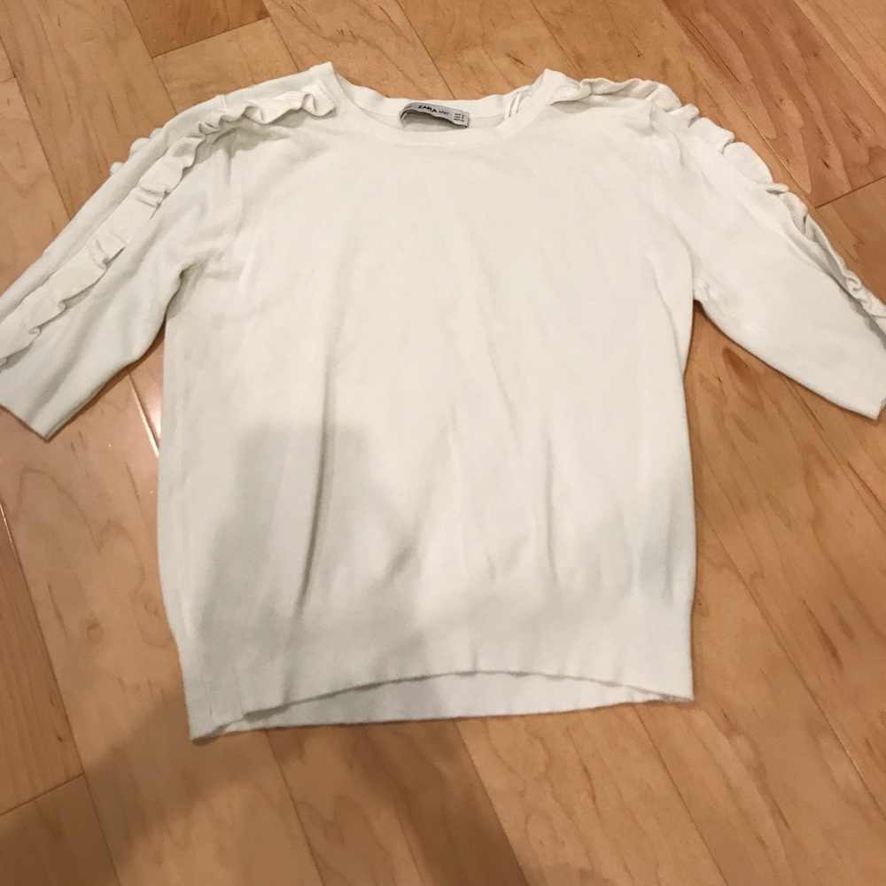 Zara knit cream sweater with ruffles on sleeves.