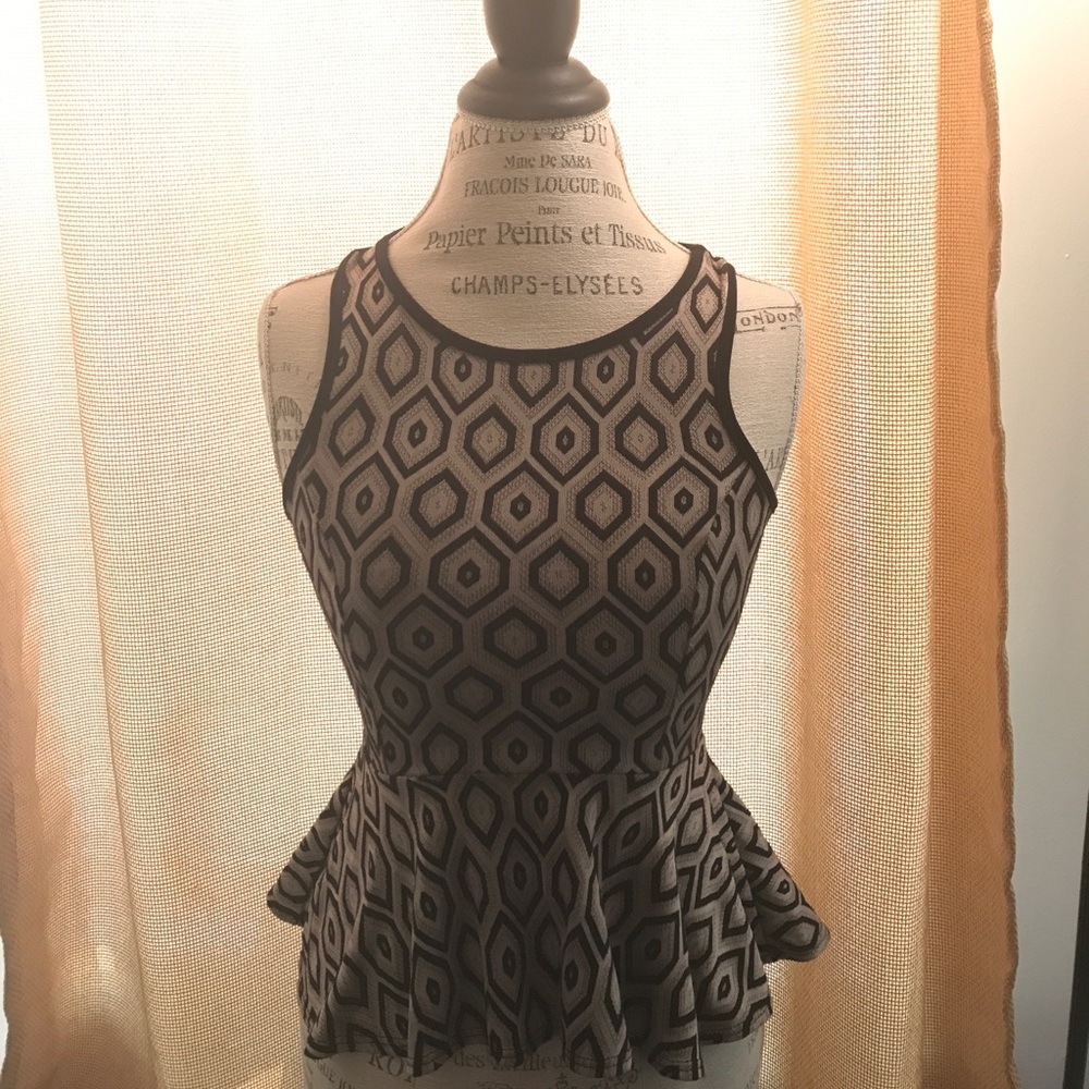Printed peplum top with mesh back