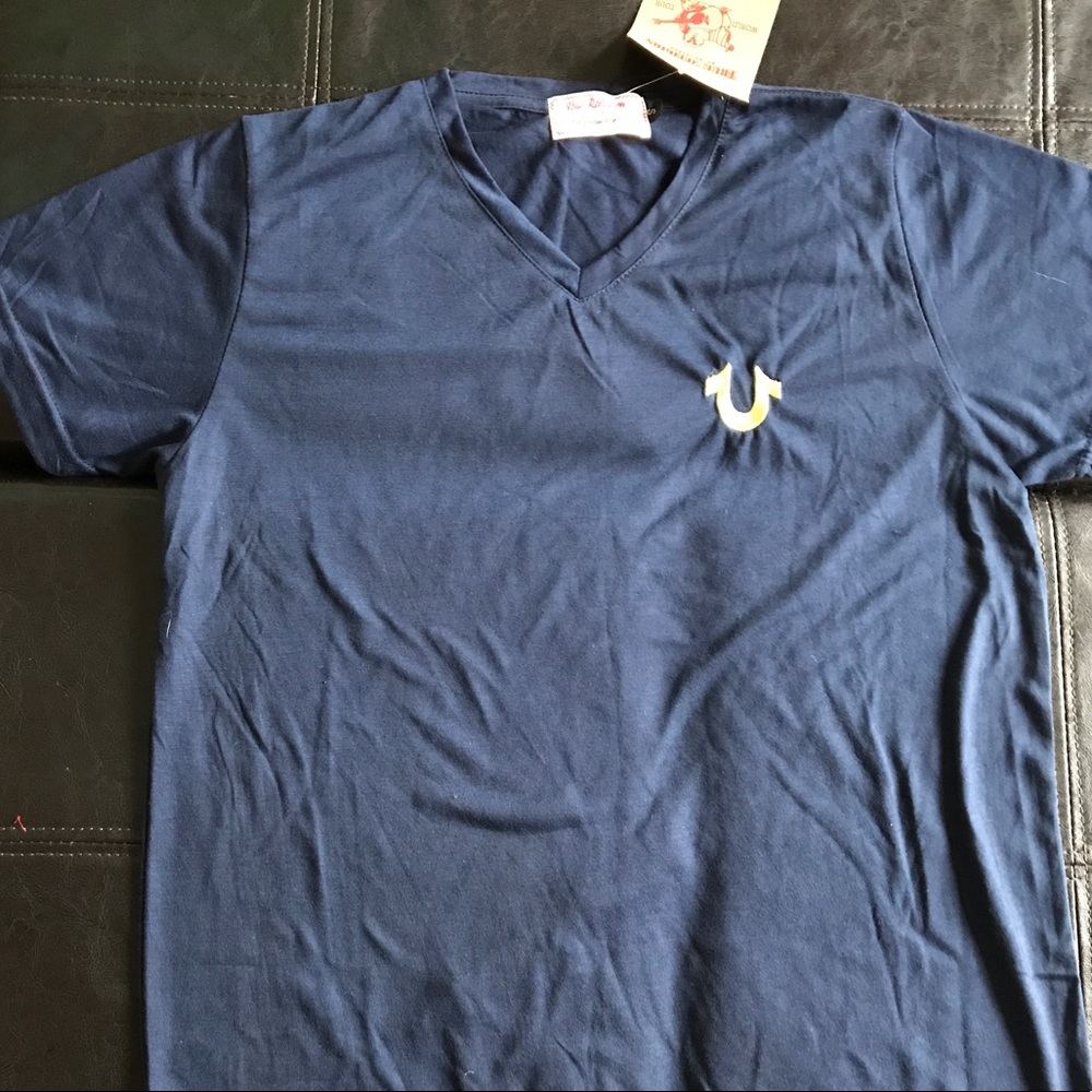 True religion t-shirt blue and yellow stitching.