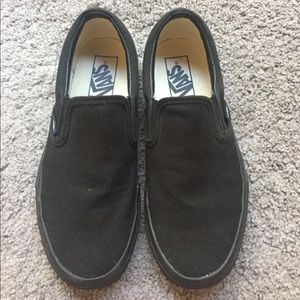 Black Vans slip ons