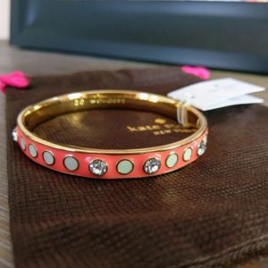 KATE SPADE Gold Enamel 'Do Wonders' Bangle - Coral
