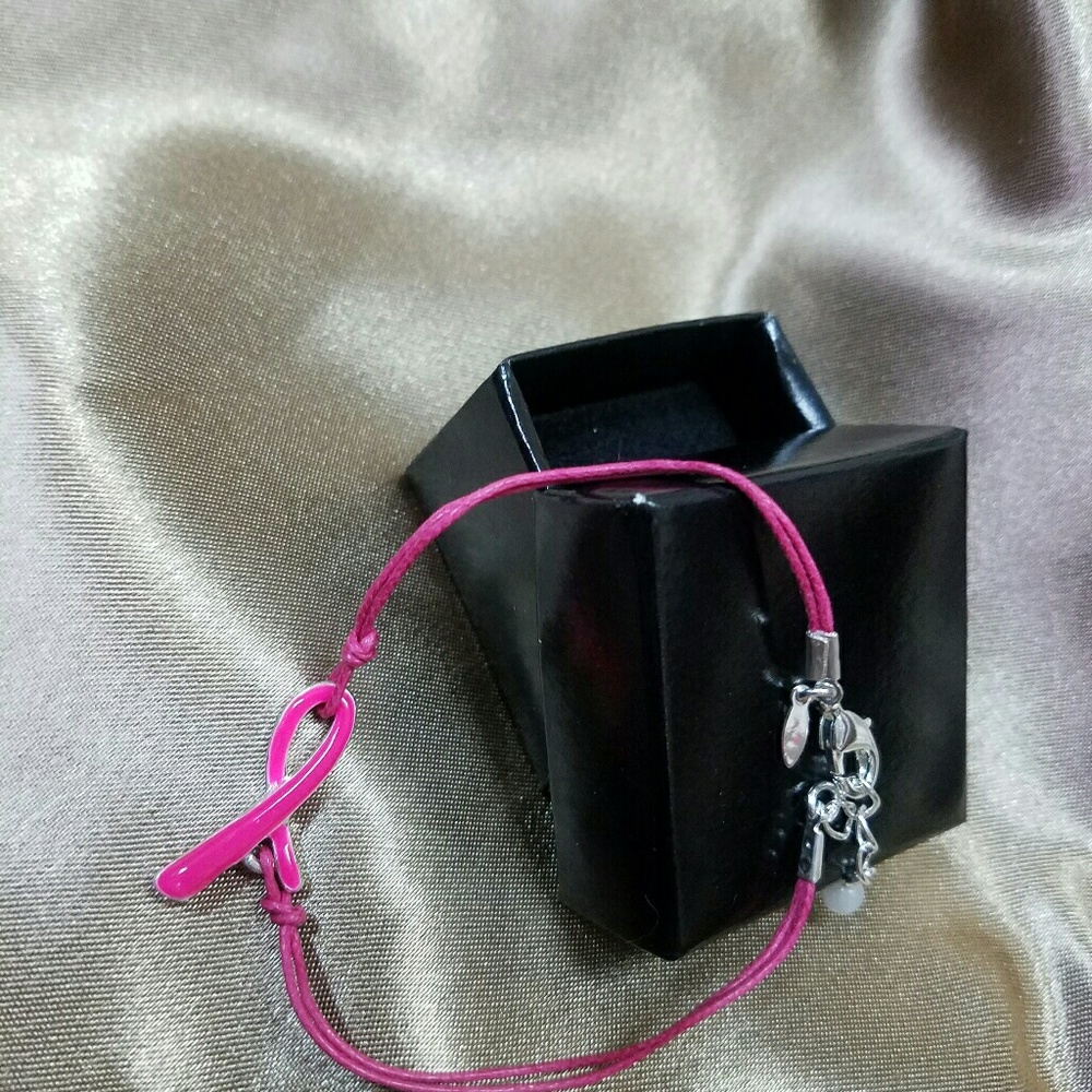Pink cord support bracelet