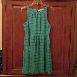A green eyelet dress