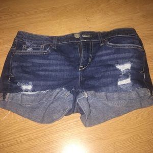 Blue ripped jean shorts