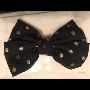 black and gold polka dot bow