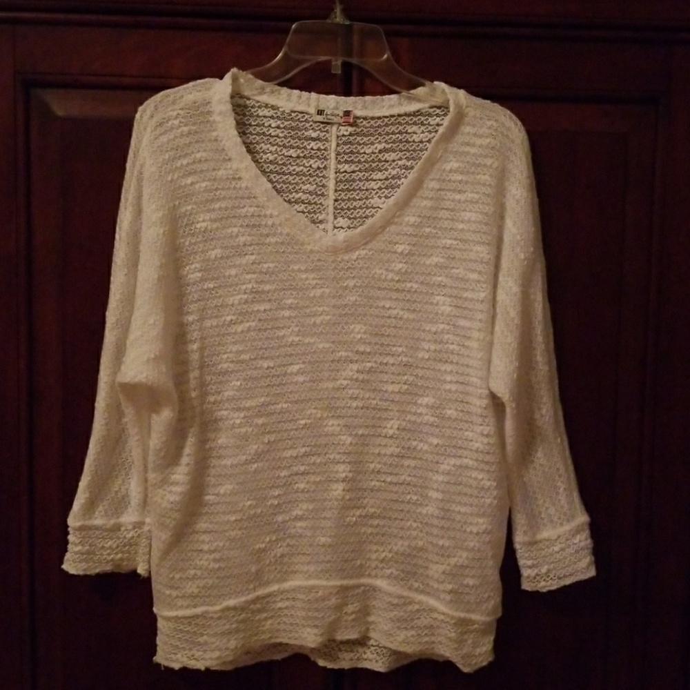 A very light weight sweater like shirt