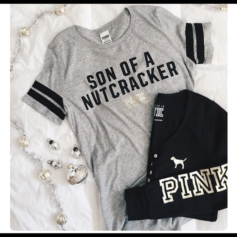 "Son of a nutcracker" pink shirt.