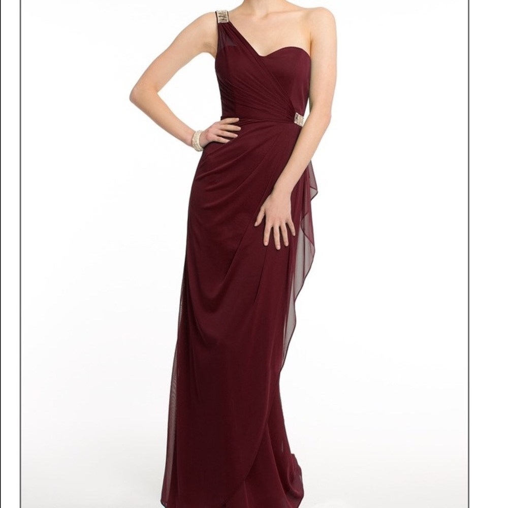 Wine evening gown with gold brooch