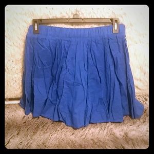 Short blue full skirt