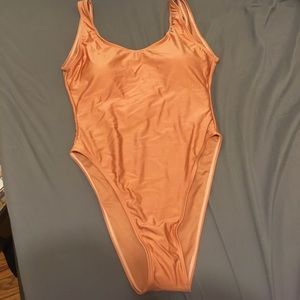 Nude one piece swim suit