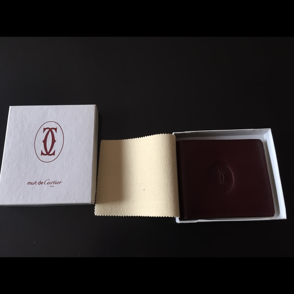 Three left Price drop Must de Cartier men's wallet
