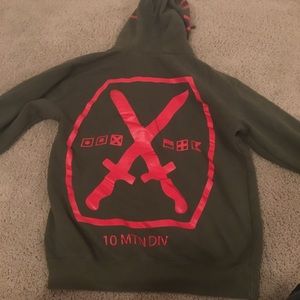 Army Green Isvera Zip Up Hoodie with red graphic