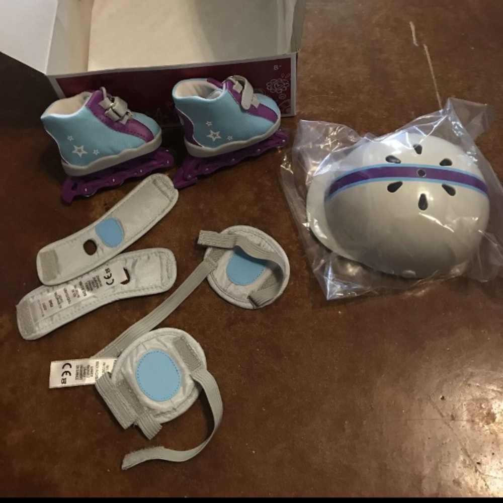 American girl new in box skating set