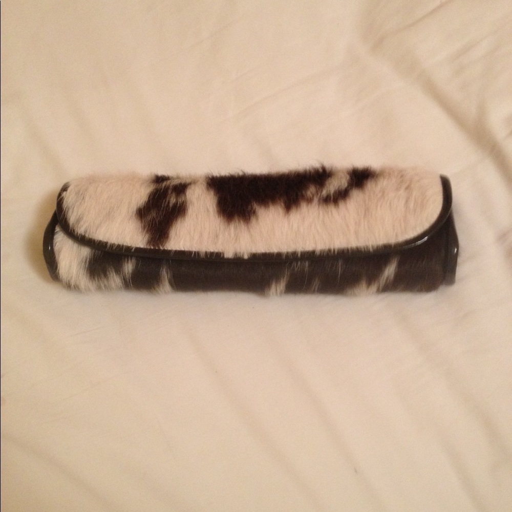 Never used cow fur clutch
