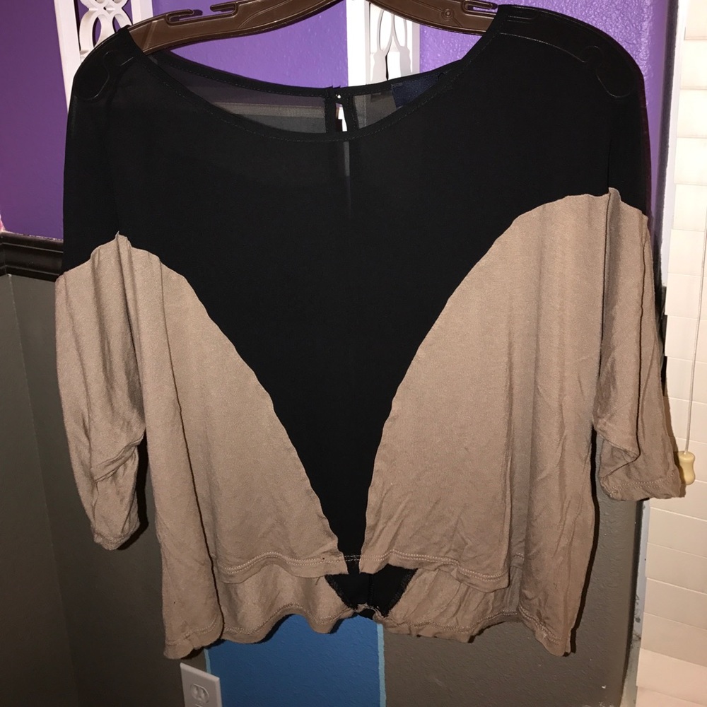 Tan and black shirt
