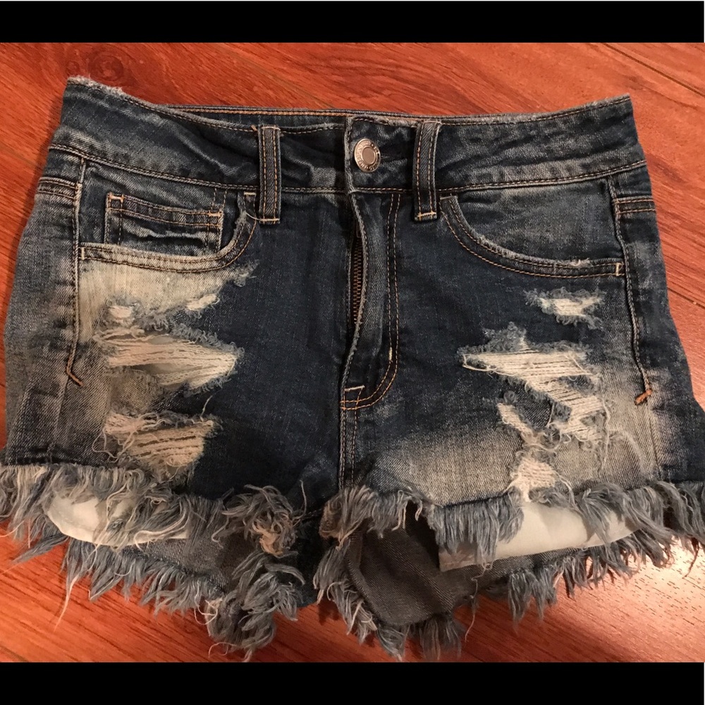 Distressed denim shorts